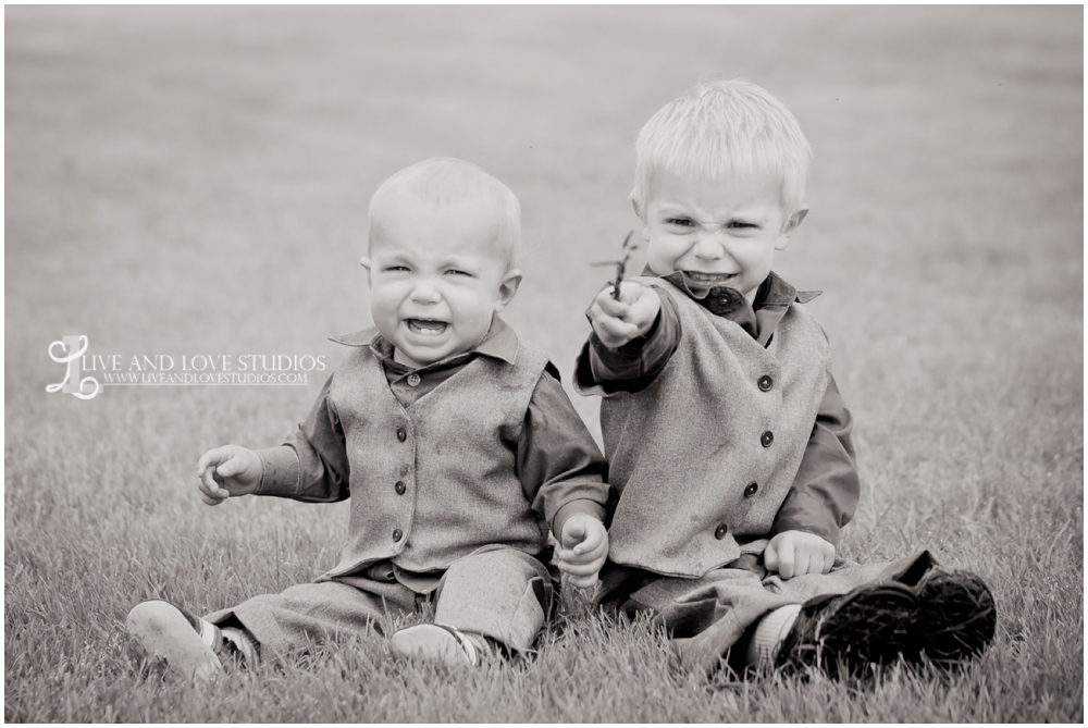 Plymouth Minnesota Family Photographer Photo of Child Crying with Brother | Live and Love Studios